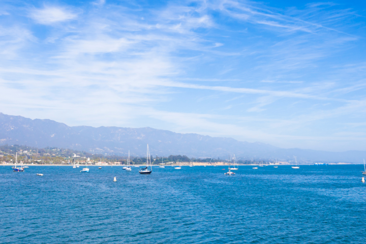 a small boat in a large body of water